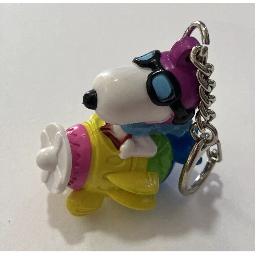 Snoopy Flying An Easter Egg Plane,‎ Peanuts Vintage Collectible Keychain 2.5"